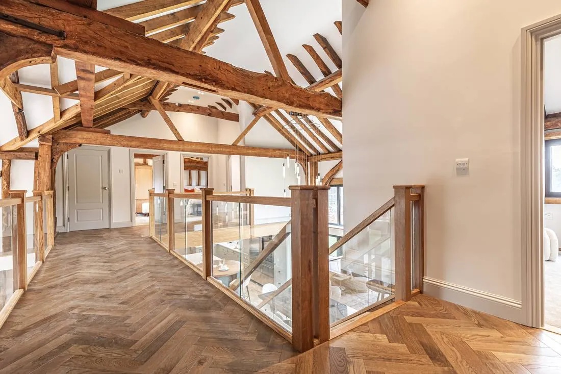 Restored centuries-old oak roof trusses in a completed Blythcarr barn conversion